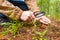 Photo of biologist with magnifying glass