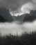 Photo of Black and White Yosemite Tunnel View Obscured by Heavy Fog with Stormy Dark Grey Clouds Approaching