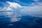 Photo of Blue Sea and Tropical Sky Clouds. Seascape. Sun over Water,Sunrise. Horizontal. Nobody Picture. Ocean
