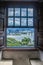 Photo of the buildings in the city of Vitoria seen through the window of the Penha Convent