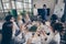 Photo of business people diversity colleagues sit table applauding partner anti crisis crash strategy plan professionals