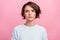 Photo of calm charming pretty focused lady bob hairdo look camera wear blue sweater isolated pink color background