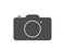 Photo camera illustration in black and white in flat design. Picture and snapshot digital photocamera. Isolated snapshot icon.