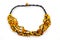 A photo captures a black-corded necklace adorned with polished Baltic amber. The golden-brown hues of the amber, set against the