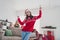 Photo of carefree pretty lady hold glass champagne dance congrats concept wear hat sweater in decorated x-mas home