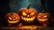 Photo of carved pumpkins on wooden floor