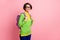 Photo of charming adorable young lady dressed yellow shirt glasses backpack empty space isolated pink color background