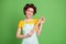 Photo of charming cheerful lady curlers hairdo housewife hold rolling pin kitchen look up empty space dreamy thinking