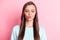 Photo of charming coquettish young lady send air kiss closed eyes wear pullover  on pink color background