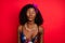 Photo of charming flirty curly dark skin woman dressed pinup clothes sending you kiss closed eyes  red color