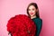 Photo of charming lady red bright lipstick enjoy large hundred roses bouquet boyfriend 8 march present wear green dress