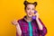 Photo of charming lady two funny buns hold cable telephone handset speaking chatting friends discussing fresh gossips