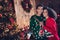 photo of charming loving family couple wife husband celebrate christmas eve dance near illuminated pine tree indoors