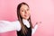 Photo of cheerful brunette little girl wear uniform formalwear hand empty space selfie isolated on pink color background