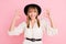Photo of cheerful girl show two hands okey sign wear vintage hat dotted blouse isolated pink color background