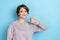 Photo of cheerful glad lovely woman bob hairstyle wear gray sweatshirt showing thumb up nice job isolated on blue color