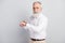 Photo of cheerful grey hair old man boss look watch wear spectacles white shirt isolated on grey color background