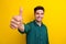 Photo of cheerful man wear stylish clothes hand demonstrate thumb up cool feedback nice offer isolated on yellow color