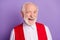 Photo of cheerful old happy grandfather good mood wink eye smile face isolated on purple violet color background