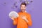 Photo of cheerful overjoyed man can't believe he won money lottery prize isolated on violet color background