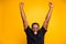 Photo of cheerful positive crazy excited man in spectacles black t-shirt screaming shouting with rude face expression