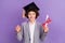 Photo of cheerful positive schoolkid hold diploma graduation win wear hat grey suit isolated violet color background