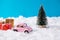 Photo of christmas banner tiny pink automobile driving back home snowy road after big discounts shopping large greeting