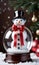 Photo Of Christmas Snowman Wearing A Ribbon Bow Holding A Glass Snow Glob. Generative AI