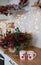 Photo of Christmas table decoration, festive dinnerware with lights and for tea in decorated dinner room, luxury utensil