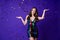 Photo of classy lady prom queen catch throw confetti falling wear sequins mini dress isolated purple color background