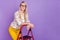 Photo of clever charming mature lady dressed print blouse glasses rising stairs empty space smiling  purple