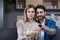 Photo of close couple man and woman together at home having fun and happily watching TV and eating popcorn