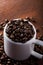 Photo closeup of coffee beans. Rusty background.