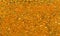 Photo of closeup texture of orange spice for meat and chicken and other food, background