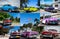 Photo collage from classic cars in Cuba with national cuban flag