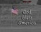 Photo of a colored flag with a black and white background and the words `God Bless America` added along with date.