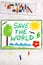 Photo of colorful drawing: Words SAVE THE WORLD on paper.