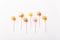 Photo of colorful lollypops on white table