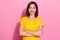 Photo of confident charming young woman wear yellow outfit arms crossed smiling isolated pink color background