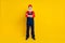 Photo of confident good mood senior guy dressed uniform overall red hardhat arms crossed isolated yellow color