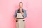Photo of confident smart man pensioner dressed grey shirt apron arm chin isolated pink color background