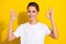 Photo of cool brown short hairdo millennial lady show okey sign wear white t-shirt isolated on yellow color background