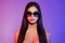 Photo of cool charming young woman naked shoulders wear sunglass flawless skin  on gradient background