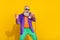Photo of cool hipster retired man rock star sing mic karaoke disco isolated on vivid color background