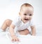 Photo of crawling eleven-month-old baby on a white background