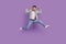 Photo of crazy active chinese man jump have fun isolated violet color background