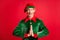 Photo of crazy astonished elf guy please x-mas christmas lucky gifts wear costume cap isolated on red shine color
