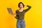 Photo of crazy confused lady hold laptop touch hand head isolated over bright yellow color background