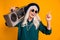 Photo of crazy cool granny lady music lover senior party tape recorder shoulder direct finger empty space wear green