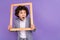 Photo of crazy excited shocked little guy hold frame look empty space wear grey suit isolated violet color background
